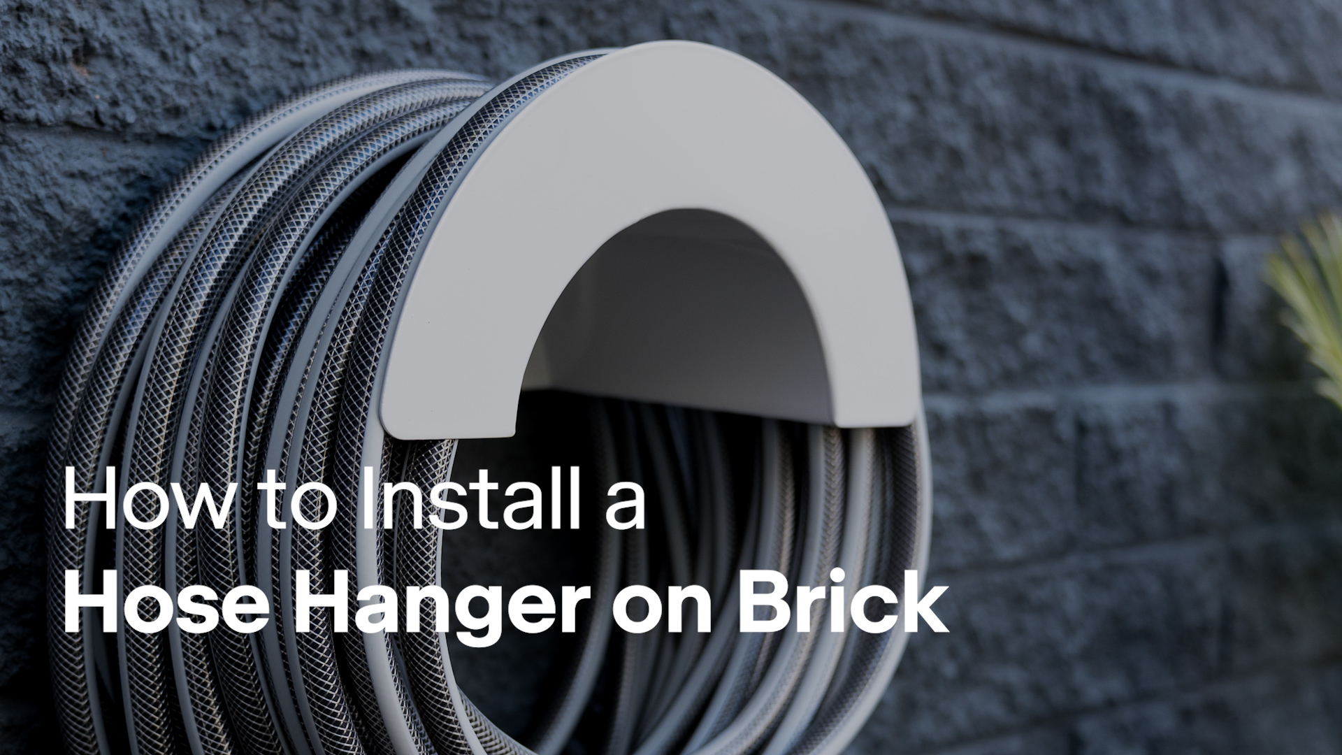 How to install a hose hanger on brick